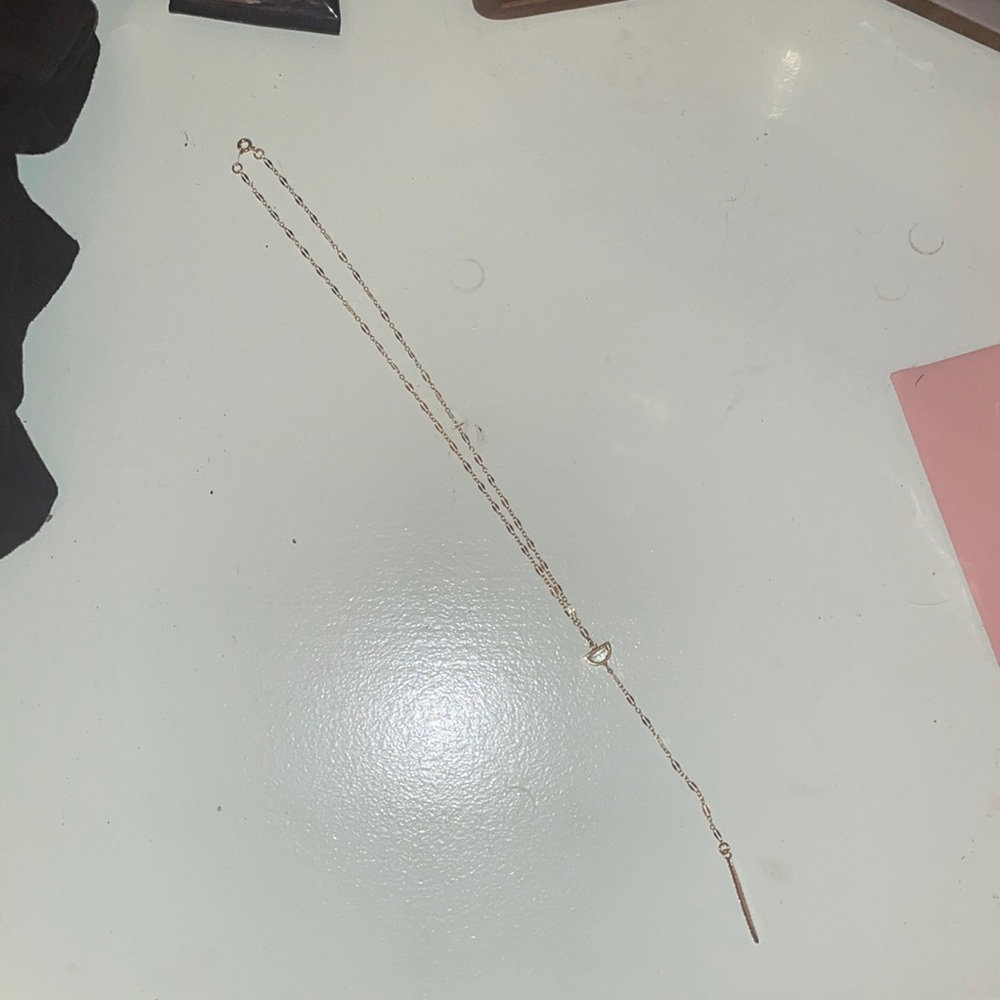 Gold necklace with sparkles